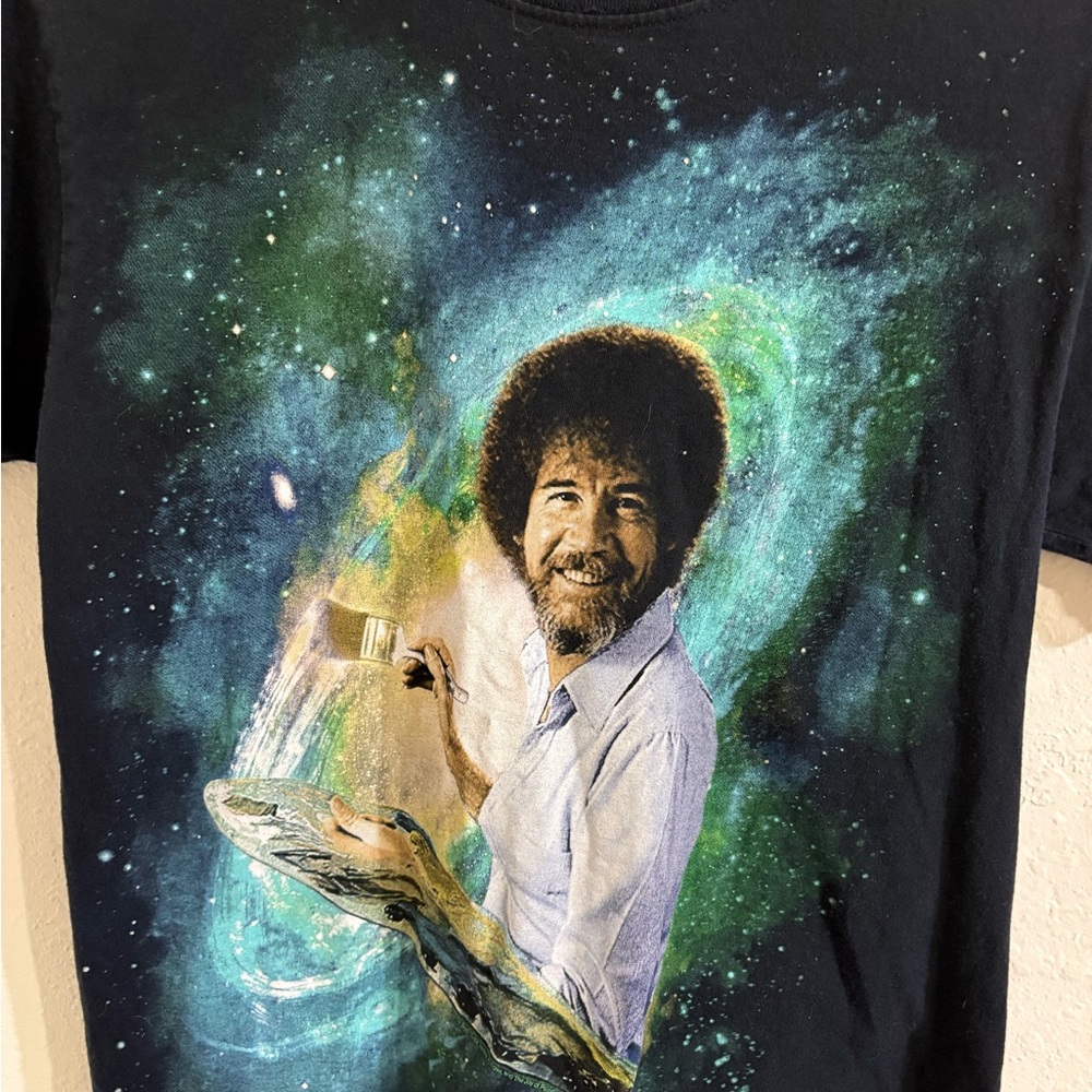BOB ROSS Black Graphic Short Sleeve Tee with cosmic design background. EUC.